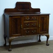 Early 20th century mahogany sideboard with raised shaped back,