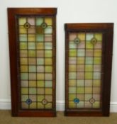 Two early 20th century lead glazed mahogany framed stained glass panels, W49cm, H116cm,