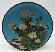 Chinese Cloisonne circular charger decorated with flowers and bamboo trellis on blue ground, D30.