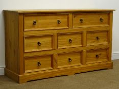 Corona pine chest, two long and six short drawers, plinth base, W141cm, H81cm,