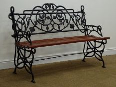 Ornate cast iron garden bench, painted black finish with hardwood seat slats,