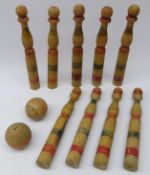 Set of nine painted wooden skittles and two balls (11) Condition Report <a