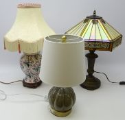 Tiffany style table lamp with lustre shade on bronzed base,