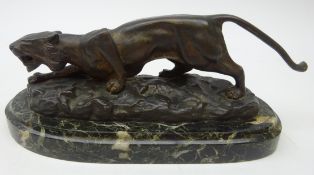 After Antoine Louis Barye, bronzed model of a snarling Tiger on oblong marble plinth,