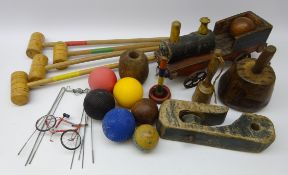 Vintage croquet set, treen mallet, masher, painted wooden model of a train,