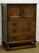 Early 20th century oak tallboy, two panelled cupboard doors above three drawers, turned supports,