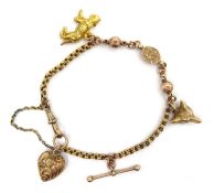 Victorian 9ct gold bracelet with fox mask and later charms Condition Report 10.