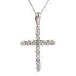 Platinum diamond set crucifix pendant, stamped 950, on 18ct gold chain,