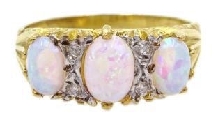 Silver-gilt three stone opal ring, stamped SIL Condition Report <a href='//www.