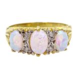 Silver-gilt three stone opal ring, stamped SIL Condition Report <a href='//www.