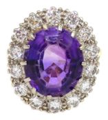 Gold oval amethyst and diamond cluster ring, stamped 18ct Condition Report Approx 7.