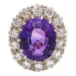 Gold oval amethyst and diamond cluster ring, stamped 18ct Condition Report Approx 7.