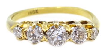 Gold graduating five stone diamond ring, stamped 18ct Condition Report Approx 2.