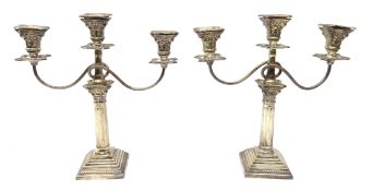 Pair of silver candelabra by A Taite & Sons Ltd,