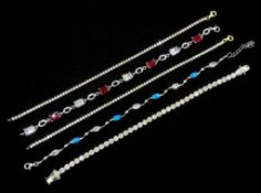 Five silver stone set bracelets,