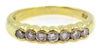 18ct gold seven stone channel set diamond ring, hallmarked Condition Report Approx 3.