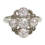Art Deco five stone diamond ring bezel, set in pierced platinum with white gold band,