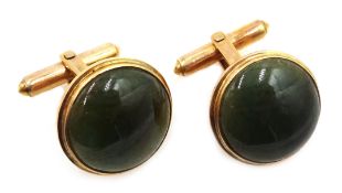 Pair of Chinese gold jade cufflinks stamped 14k Condition Report Approx 11.