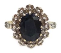 Gold sapphire and diamond cluster ring, with diamond set shoulders,