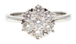 White gold seven stone diamond flower cluster ring, hallmarked 18ct,
