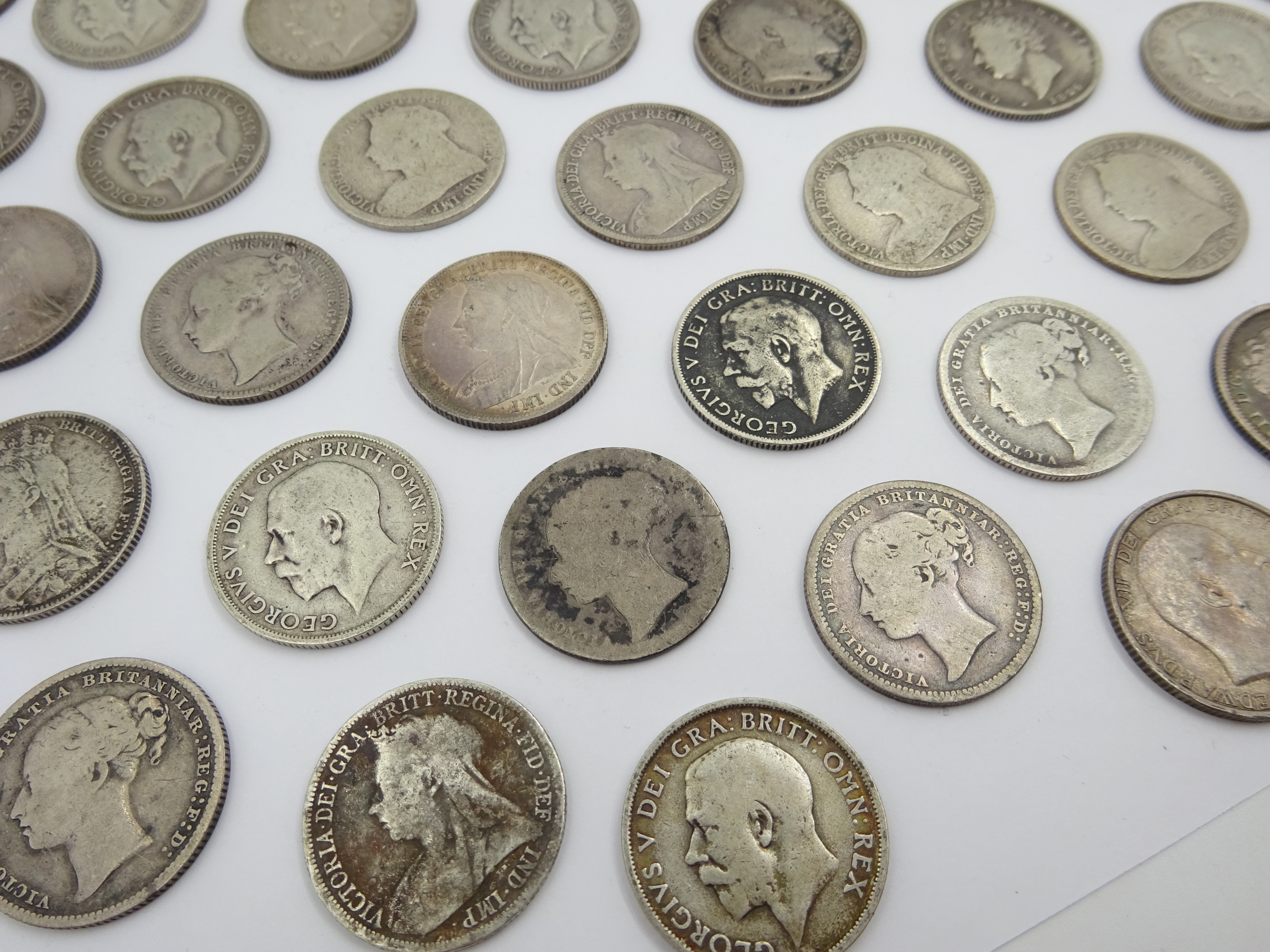 Sixty-nine pre 1920 British silver one shilling coins including; 1819, three 1826, 1871, 1872, 1873, - Image 2 of 8