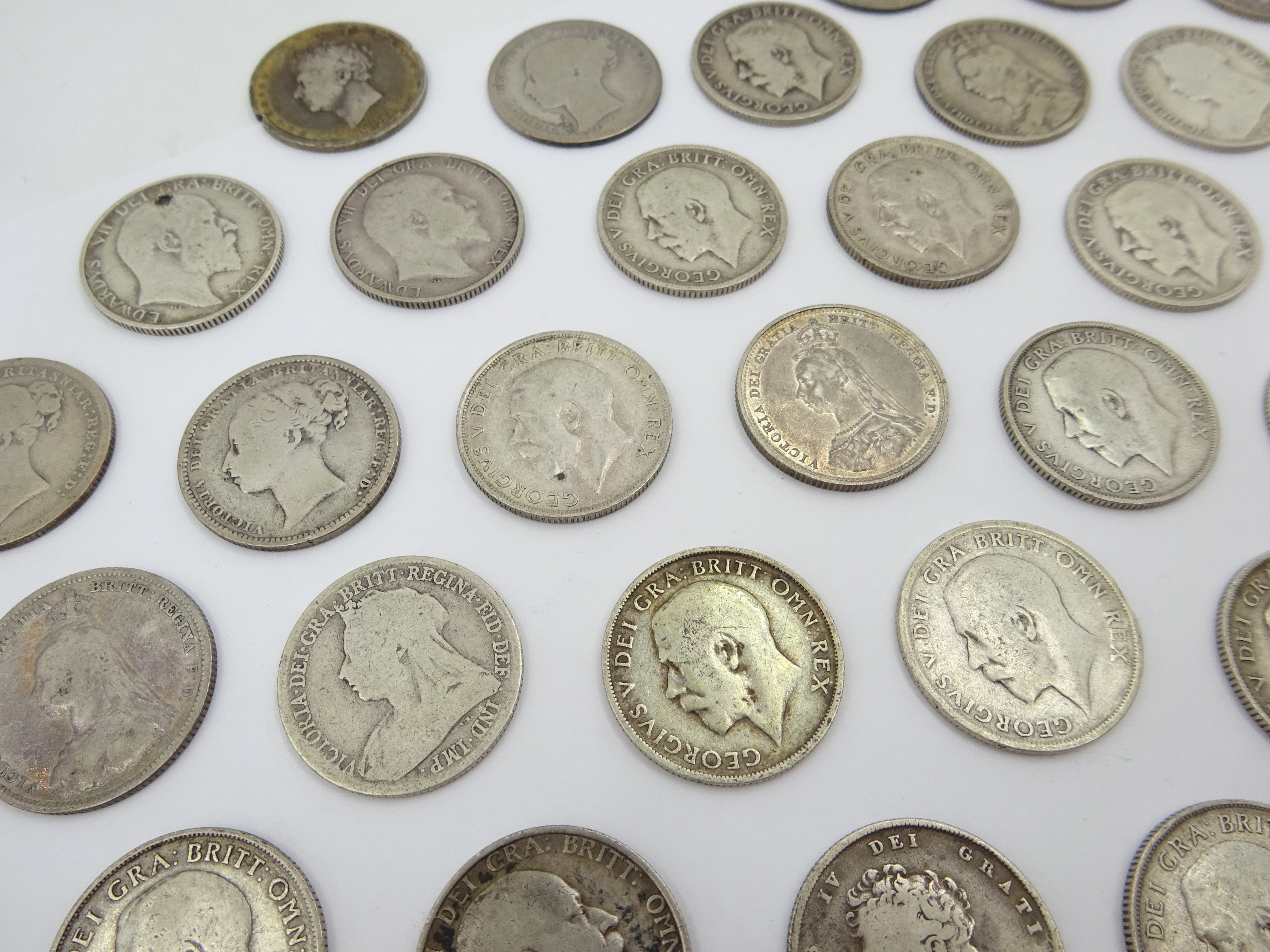 Sixty-nine pre 1920 British silver one shilling coins including; 1819, three 1826, 1871, 1872, 1873, - Image 5 of 8