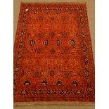 Persian red ground rug, repeating border,