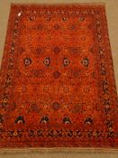 Persian red ground rug, repeating border,