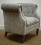 Chesterfield tub shaped armchair upholstered in silver fabric on turned supports,
