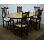 Early 20th century oval oak drop leaf table, gate leg barley twist supports (W107cm, H76cm,