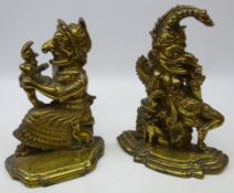 Pair of Victorian cast brass Punch and Judy fire implement rests, H29.