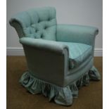 Early 20th century upholstered armchair, with buttoned back and loose seat cushion on cabriole legs,