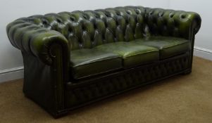 Chesterfield three seat sofa, upholstered in deep button green leather,