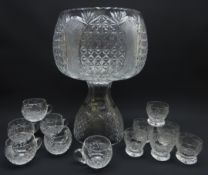 Impressive heavy cut glass crystal punch bowl on stand with hobnail and fan cut body,