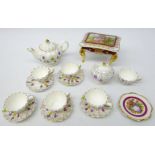 Artone hand painted miniature tea set, lacking one saucer,