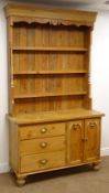 Solid pine kitchen dresser, three shelf back, two cupboard doors, three graduating drawers,
