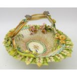 19th century porcelain basket, entwined gilded handle, woven base and floral encrusted flowers,