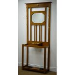 Early 20th century oak hallstand, raised mirror back, six coat hooks, hinged lid compartment,