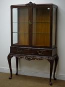 Queen Anne style display cabinet, two bevel edge glazed doors enclosing two shelves, two drawers,