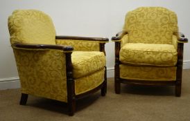 Pair 20th century walnut framed armchairs, upholstered in a gold floral pattern fabric,