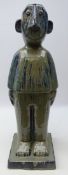 Large terracotta glazed figure of a boy on square base,