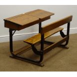 Late 20th century child's school desk, double hinged lids, folding bench seat, metal supports,