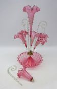 Victorian cranberry glass epergne, two clear twisted glass stems, two baskets,