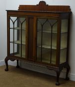 Early 20th Century mahogany display cabinet, raised shaped back,