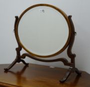 George III style inlaid mahogany oval swing table bevel edge mirror, W52cm,