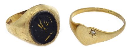Gold onyx signet ring and a gold heart shape diamond set signet ring,