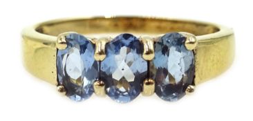 9ct gold three stone blue topaz ring, hallmarked Condition Report Approx 2.