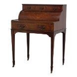 Edwardian mahogany cylinder front writing desk with three drawers,