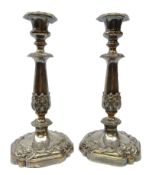 Pair Victorian Sheffield plate candlesticks of tapering form cast in relief with acanthus leaves