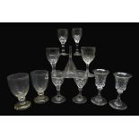 Early 19th century wine glasses including a pair with ovoid bowls,